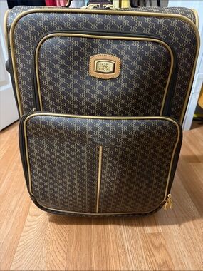 Rioni Brown and Tan Monogram Rolling Carry-On with Gold Accents
